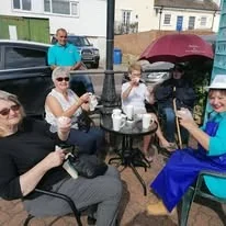 Customers enjoying The Little Blue Hut
